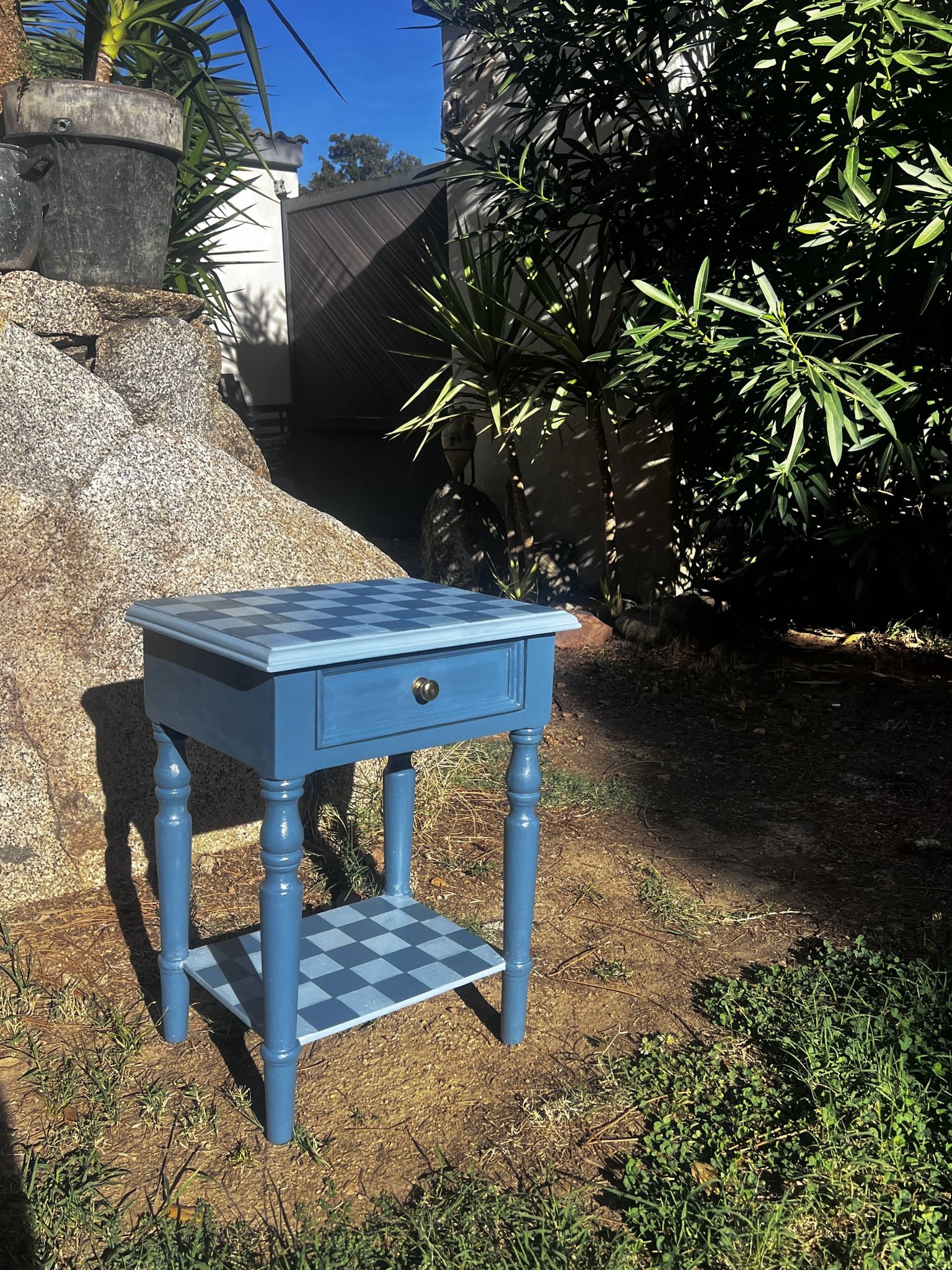 Blue checkered bedside table, neo-vintage style, turned legs.