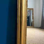 Miroir Louis-Philippe 126,5cm/75,5cm forme chapeau de gendarme, glace au mercure