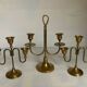 Trio of brass candlesticks with tulip bases