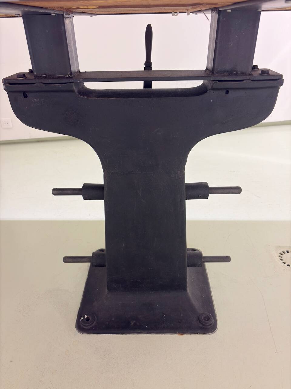 Industrial table with cast iron legs.