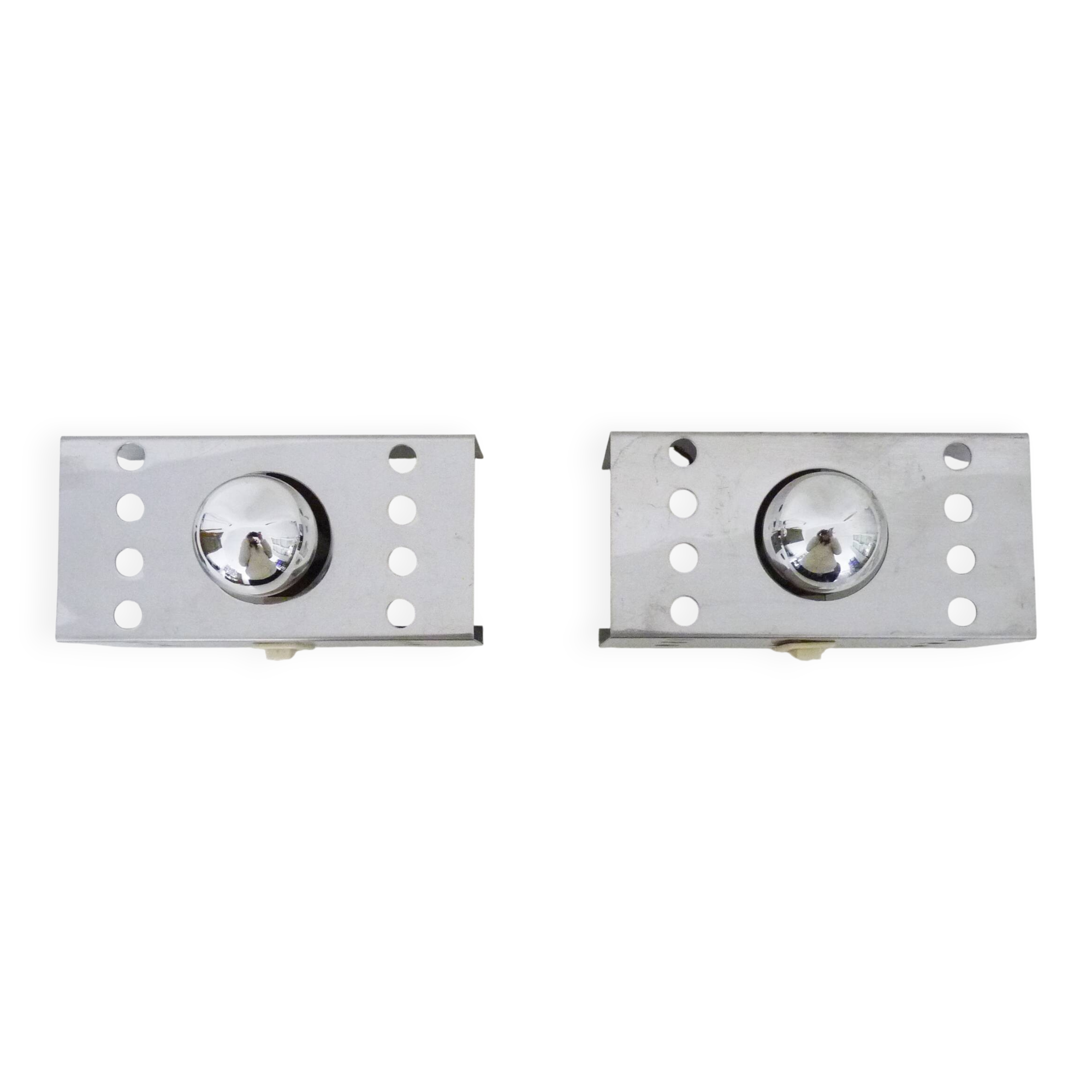 Pair of vintage chrome stainless steel wall sconces. Space Age