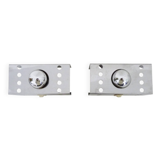 Pair of vintage chrome stainless steel wall sconces. Space Age