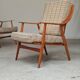 Pair of Boomerang-style armchairs in ecru beige fabric, 1960s.