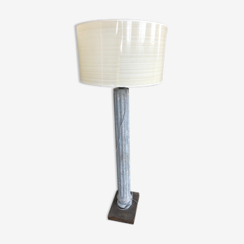 Floor lamp with vintage galvanized metal column and wooden base.