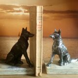 Pair of Art Deco bookends to signed wolf dogs