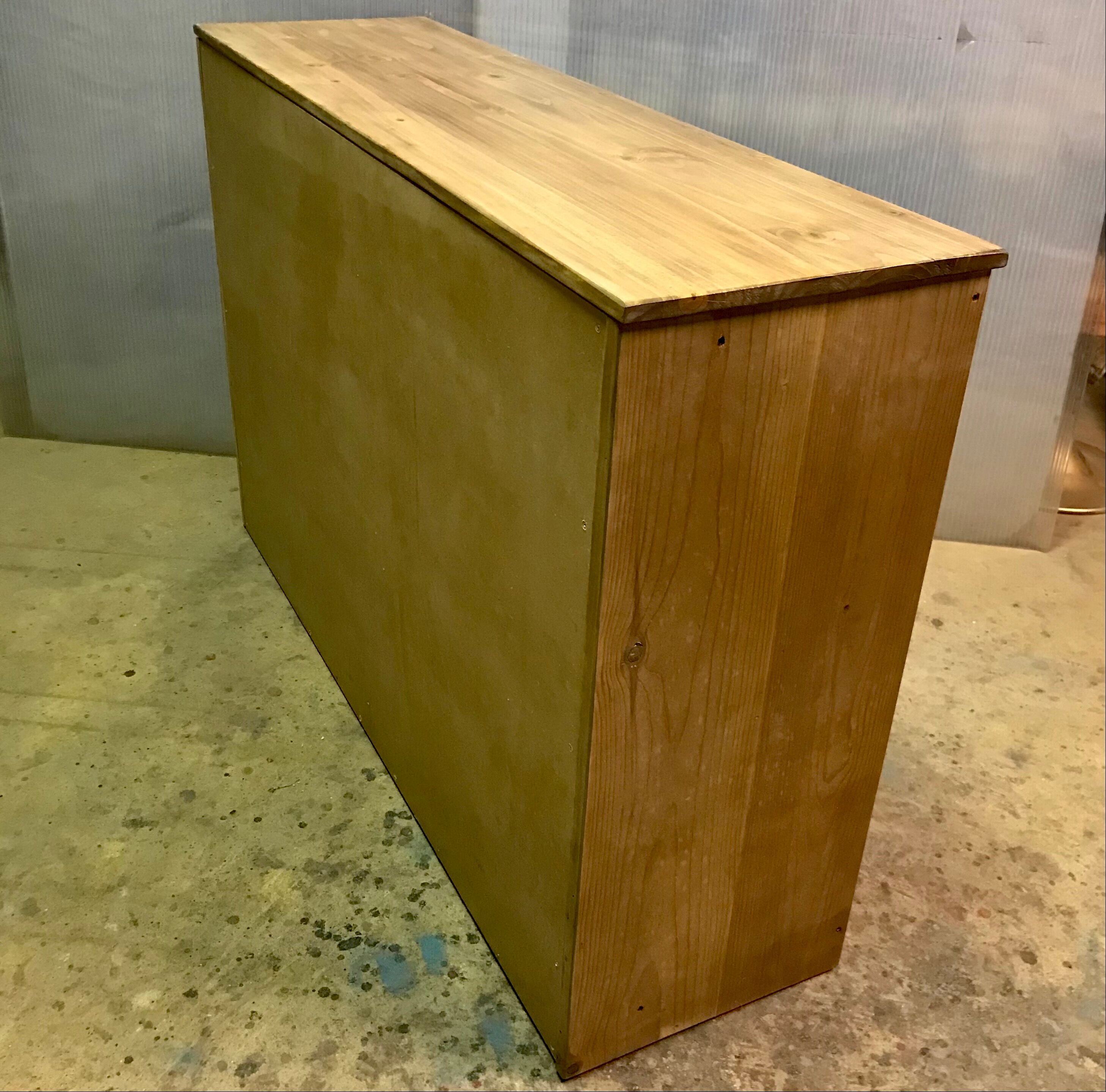 Furniture of metier enfilade with restored wooden drawers