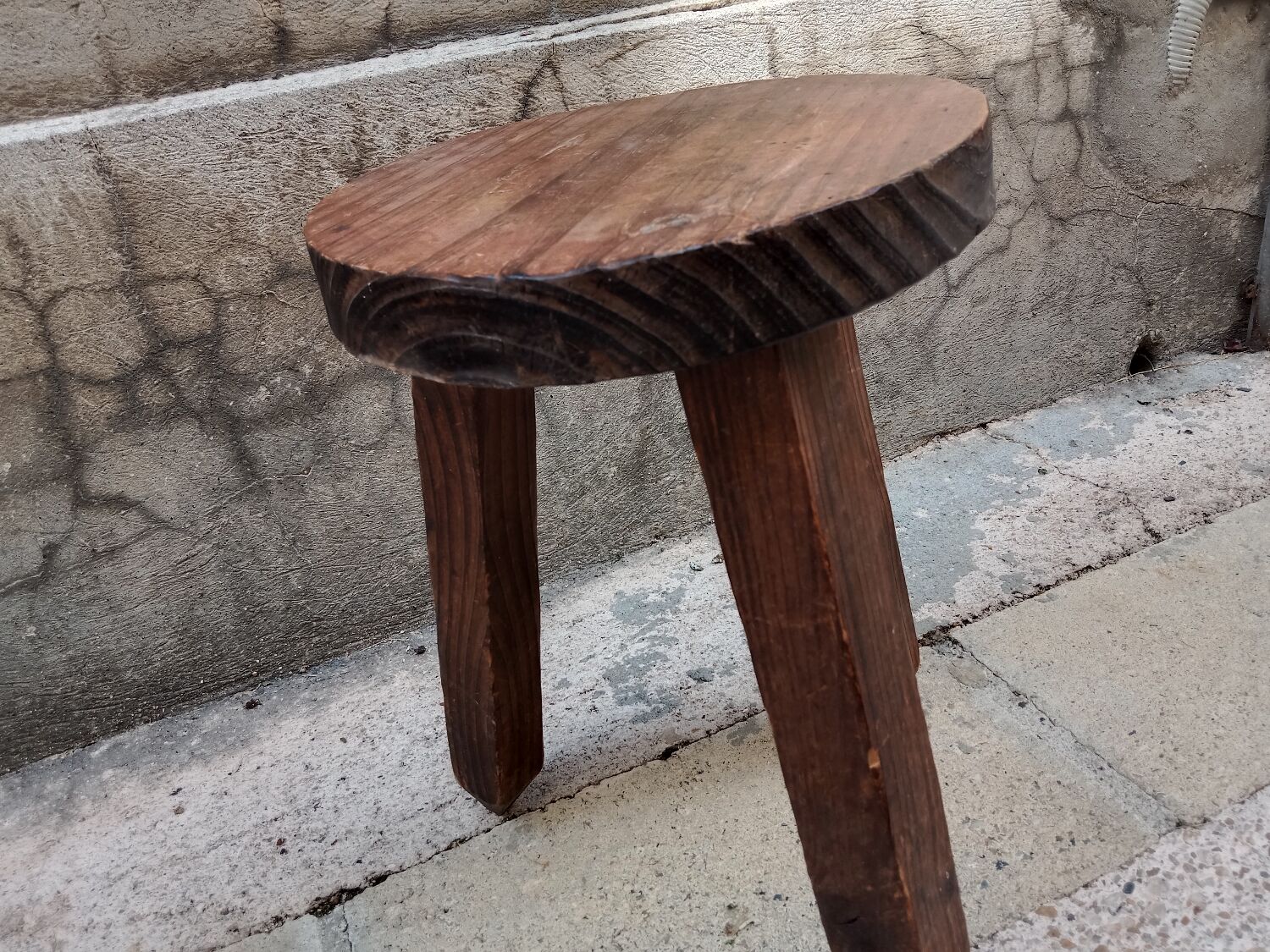 Wooden tripod stool