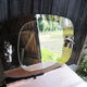 Mirror with glazed brown glass wall lights from the 70's - 79x59cm