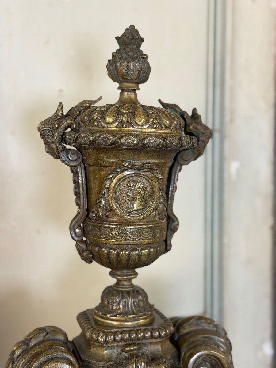 Pair of Louis XIV style andirons in bronze after a design by André-Charles Boulle.