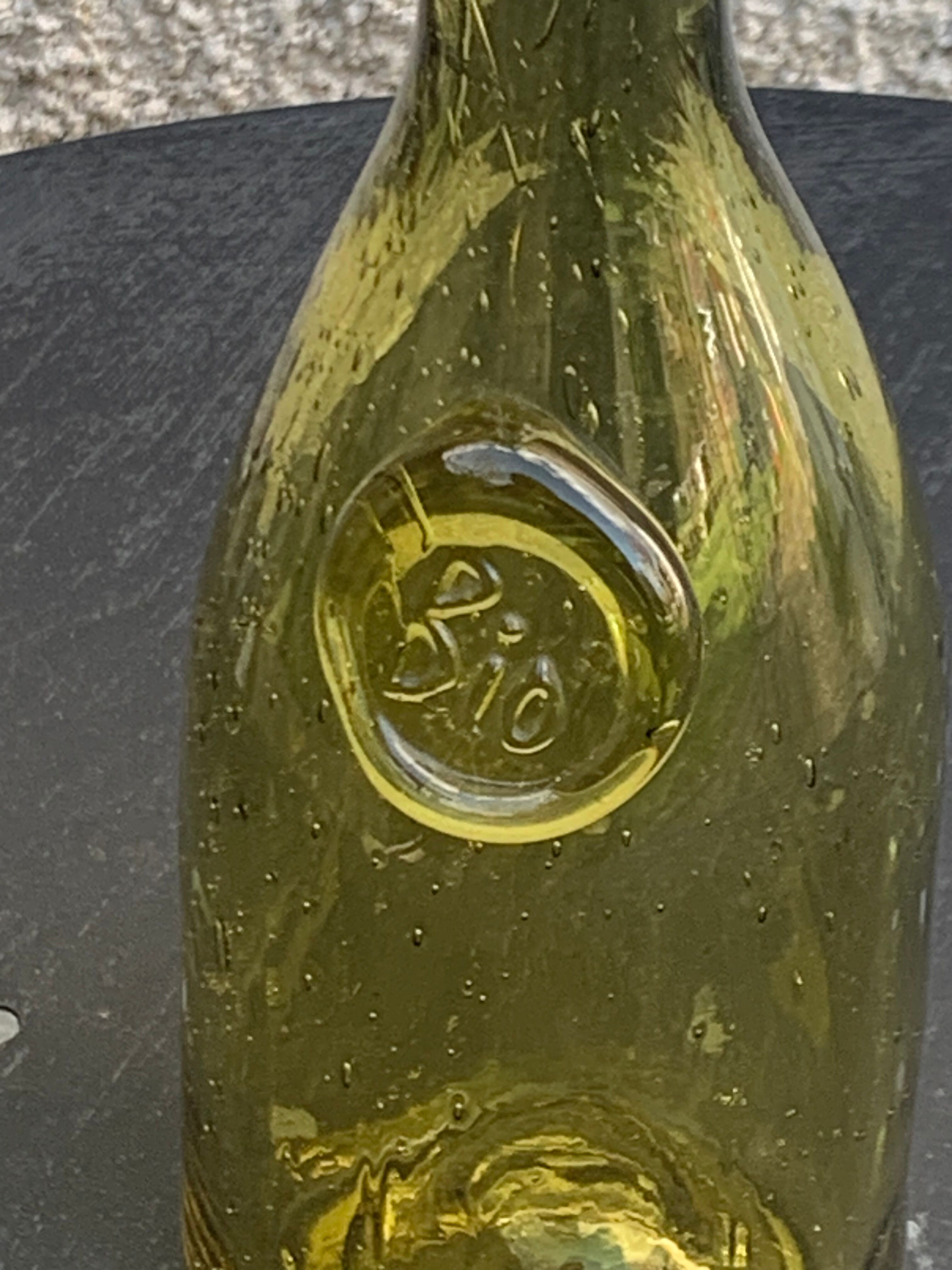 Glassblown glass decanter from the Biot collector glassworks