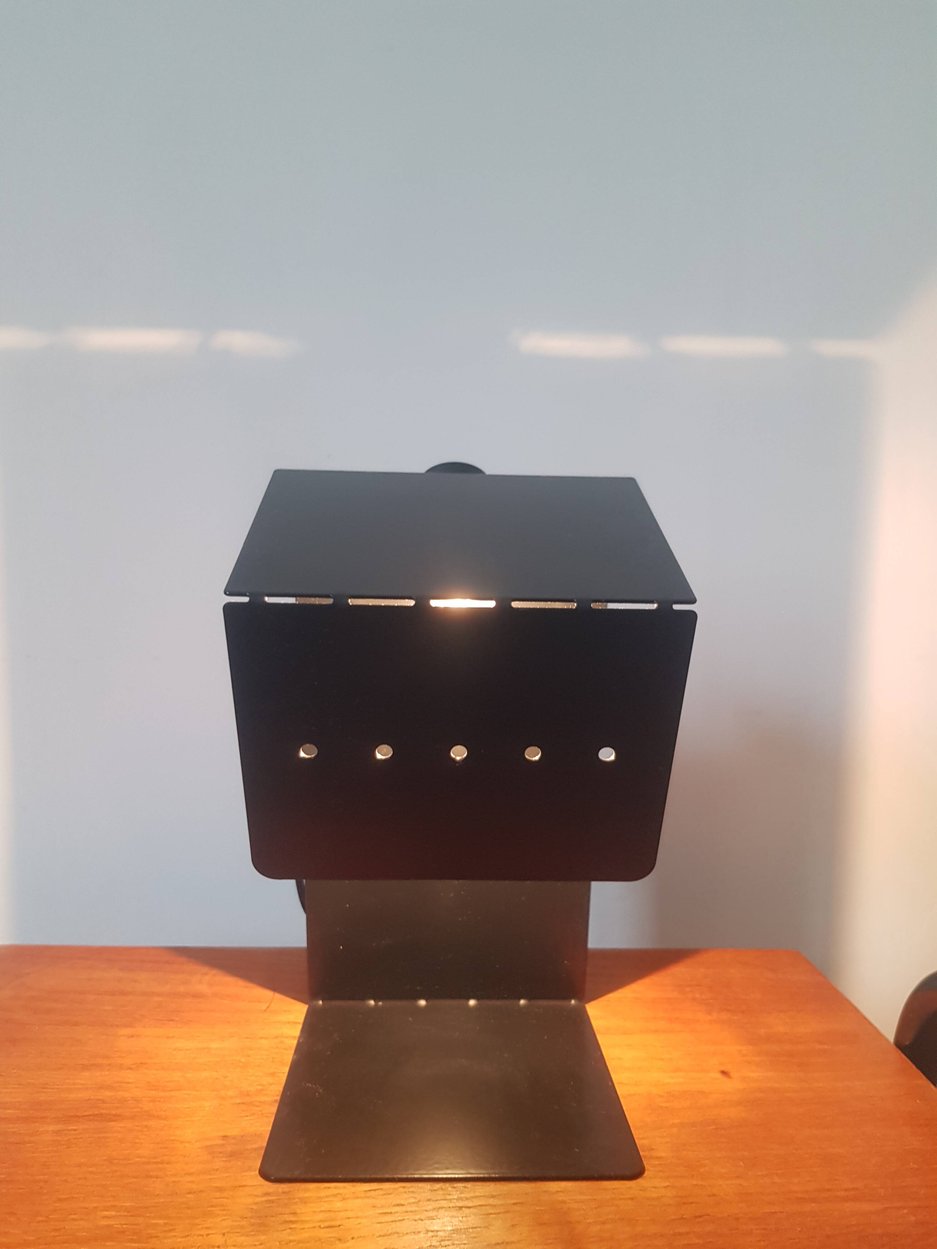 Folded sheet metal lamp