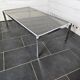 Chromed metal coffee table with smoked glass top from the 70s