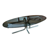 70s design oval coffee table in smoked black glass with chrome legs.