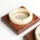Pair of wooden and bakelite ashtrays with mirrored backs from the 1930s