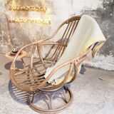 Antique swivel rattan armchair