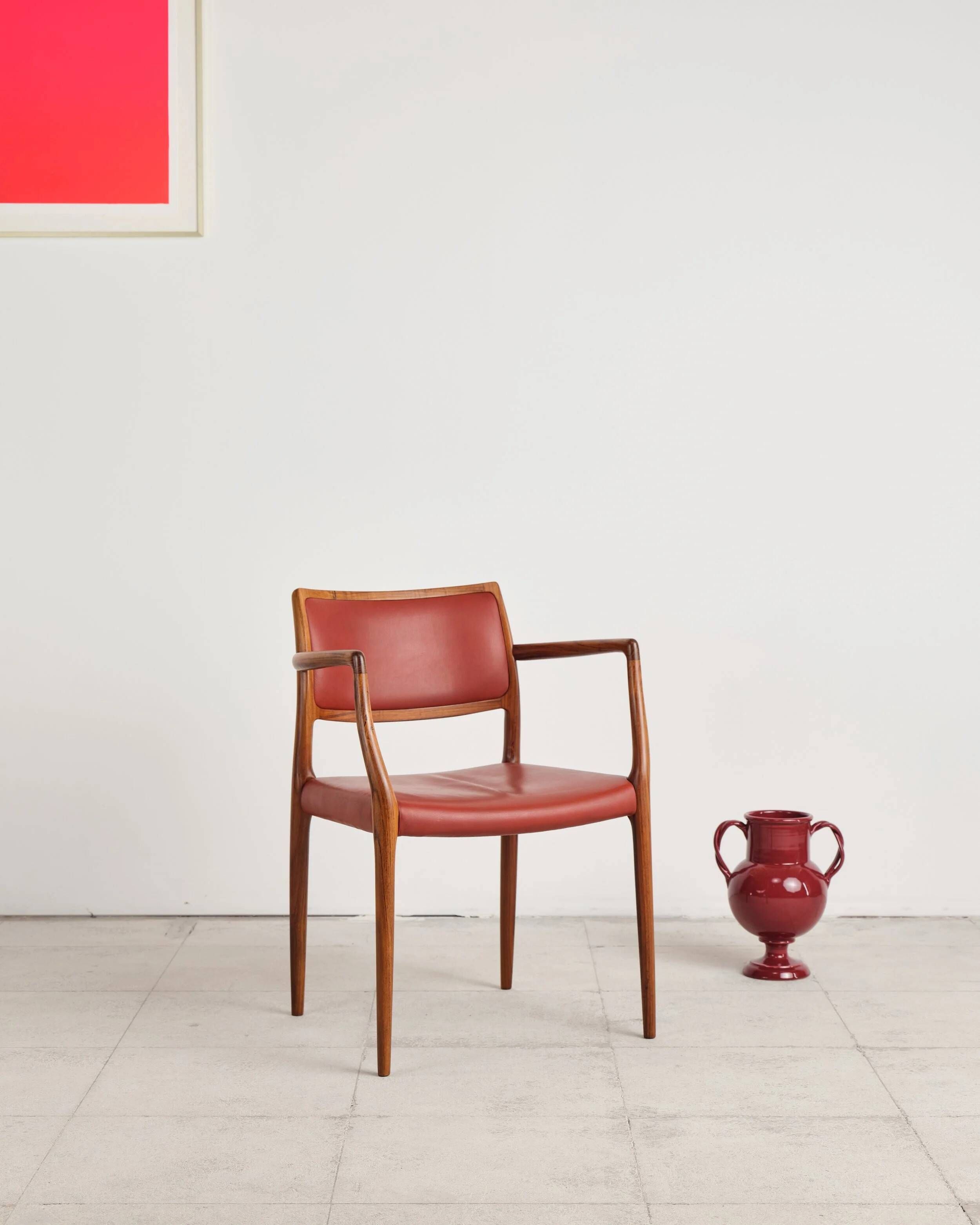 Armchair model 65 in oak and leather by Niels O. Møller, Denmark, 1960s.