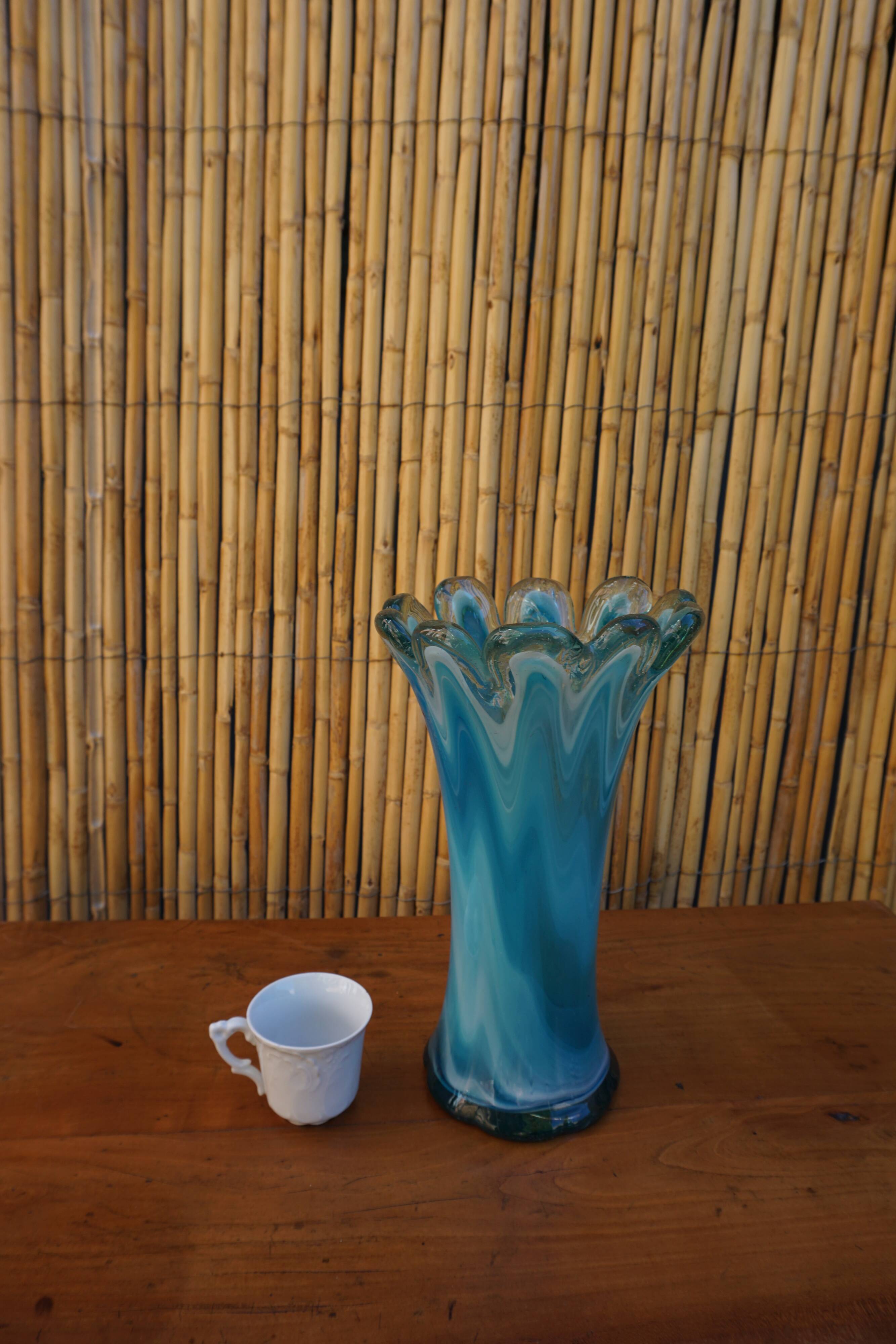 Blown glass vase in flower shape