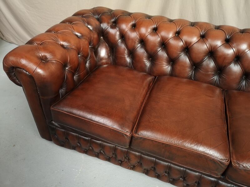 Brown leather chesterfield sofa