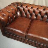 Brown leather chesterfield sofa