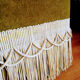 Ottoman in velvet with fringe