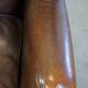 Wing chair made of sheepskin and neatly finished with black piping