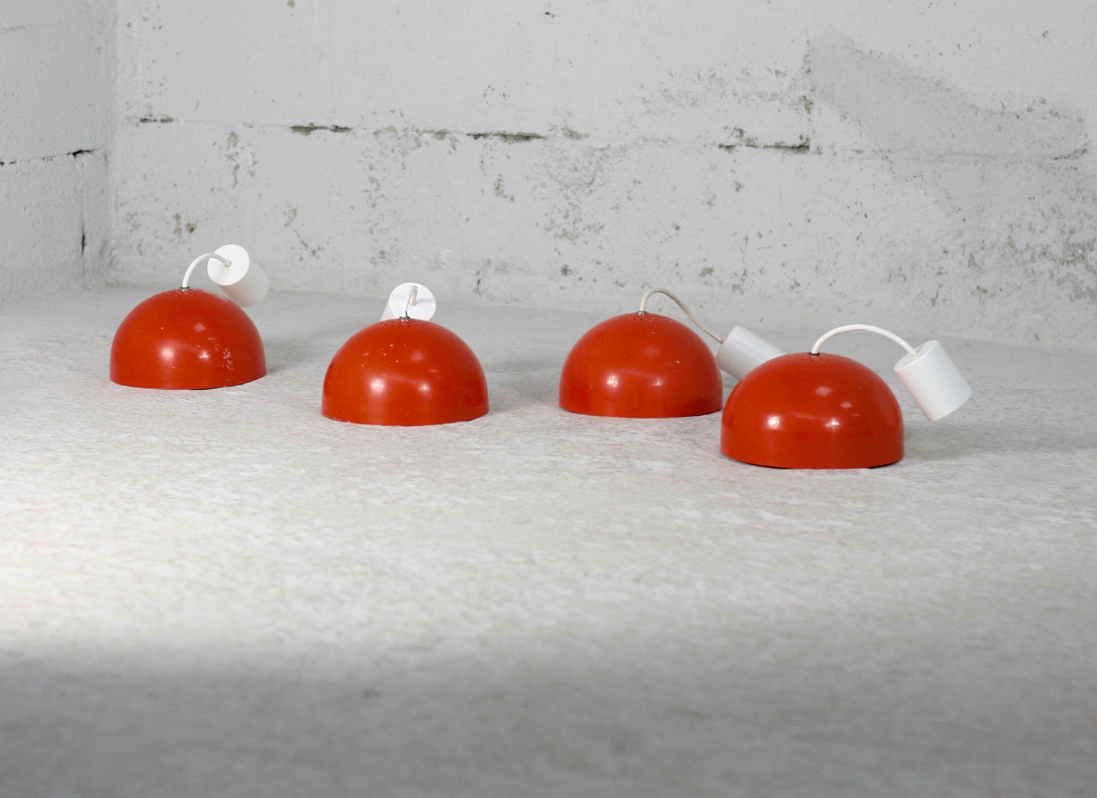 Set of 4 "spring" hanging lamps, orange steel, France, circa 1970