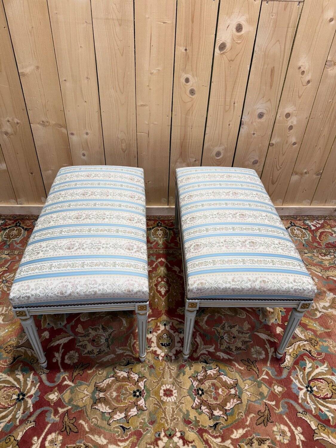 Pair of Louis XVI benches in lacquered and gilded wood