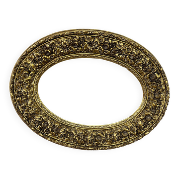 Large format golden oval frame