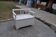 White painted pine Art Deco storage bench, filigree backrest, 1930s