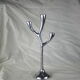 Modern mid-century aluminum three-pointed candelabra