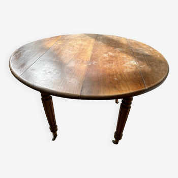 Round drop-leaf table