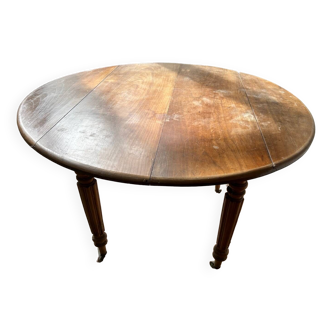 Round drop-leaf table