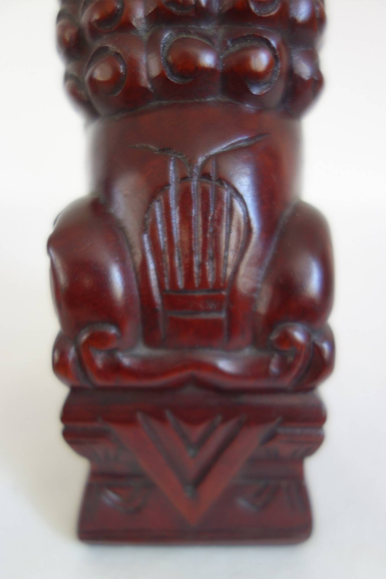 Vintage wooden pair of Foo dogs.