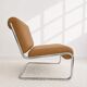 Vintage cantilever armchair. Brown faux leather upholstery. 60s
