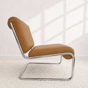 Vintage cantilever armchair. Brown faux leather upholstery. 60s