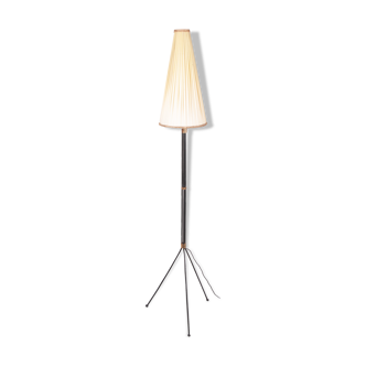 Black floor lamp on tripod base