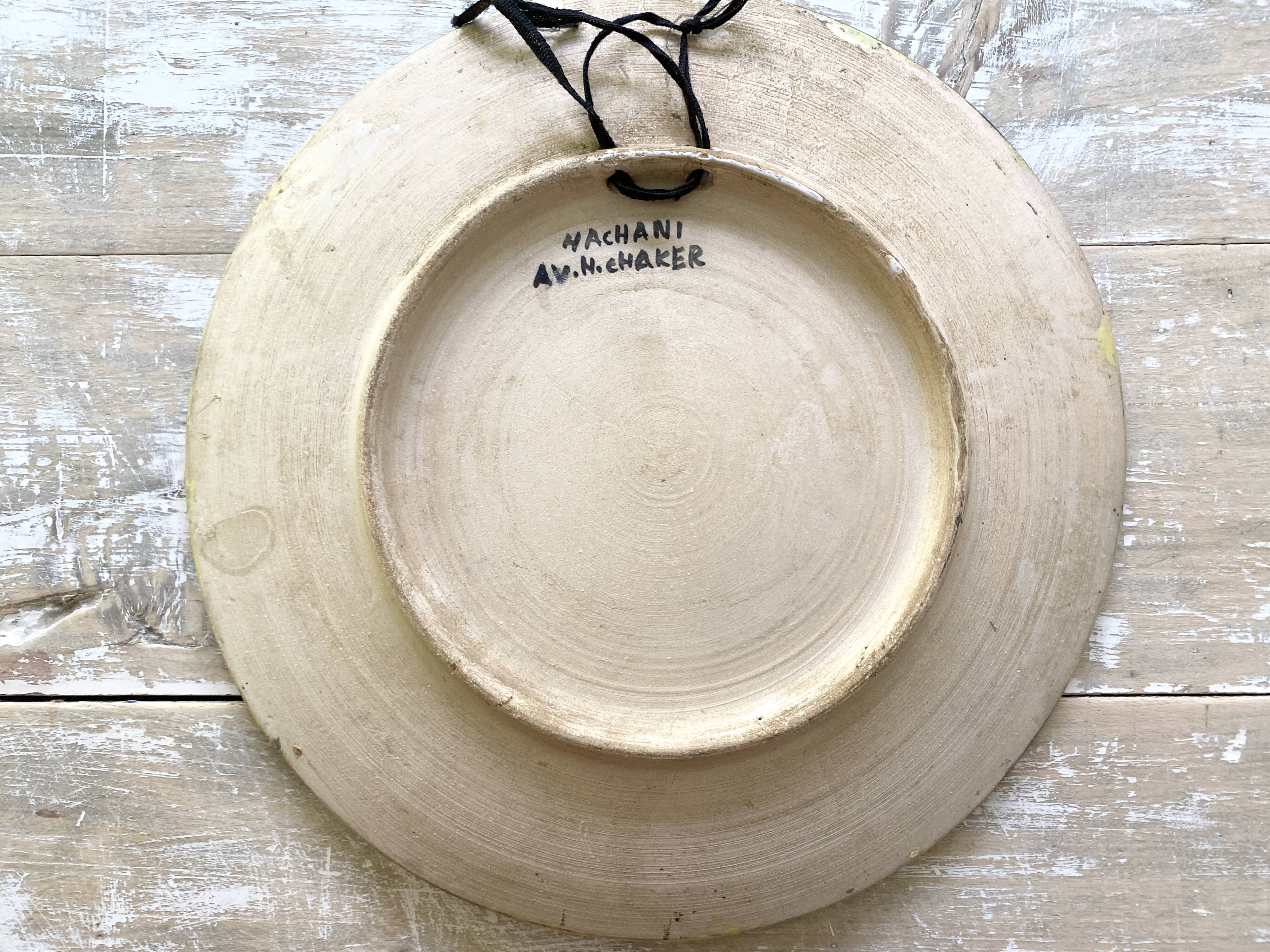 Musicians ceramic dish, signed