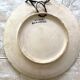 Musicians ceramic dish, signed
