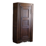 Tall antique oak wardrobe, made by a French cabinetmaker, late 19th century.
