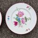 Pair of painted and signed Limoges porcelain plates