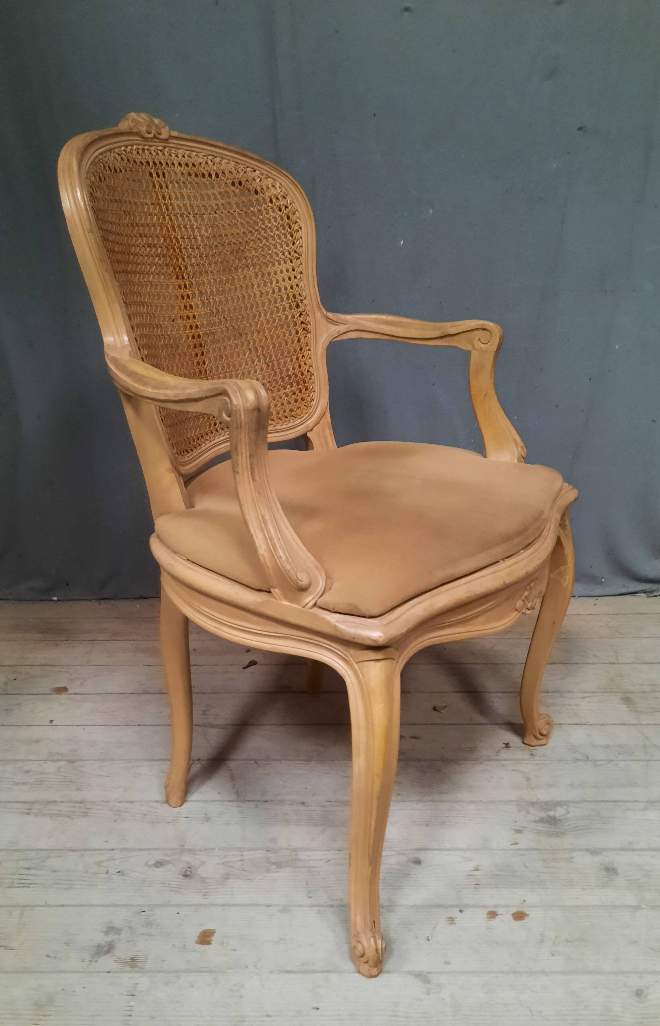 Louis XVI style caned armchair