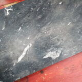 White veined black marble fireplace