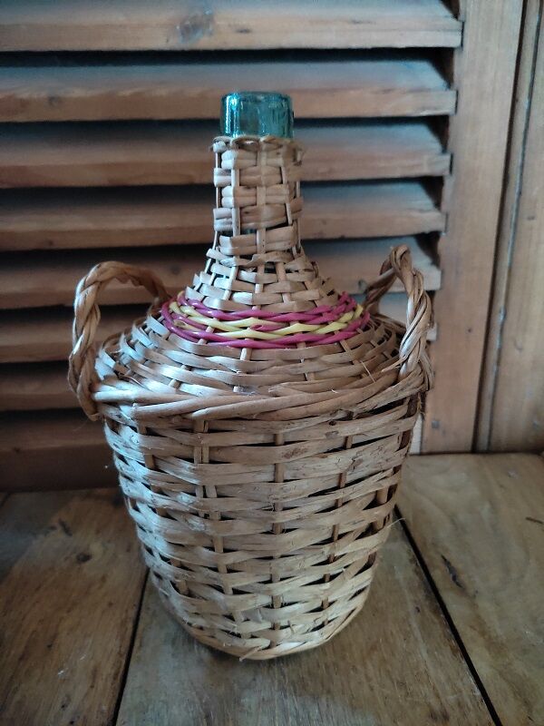 Dame Jeanne Bonbonne Bottle Touque bluish glass wicker Dp 1122414