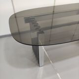 Chrome base diningroom table with smoked glass oval top