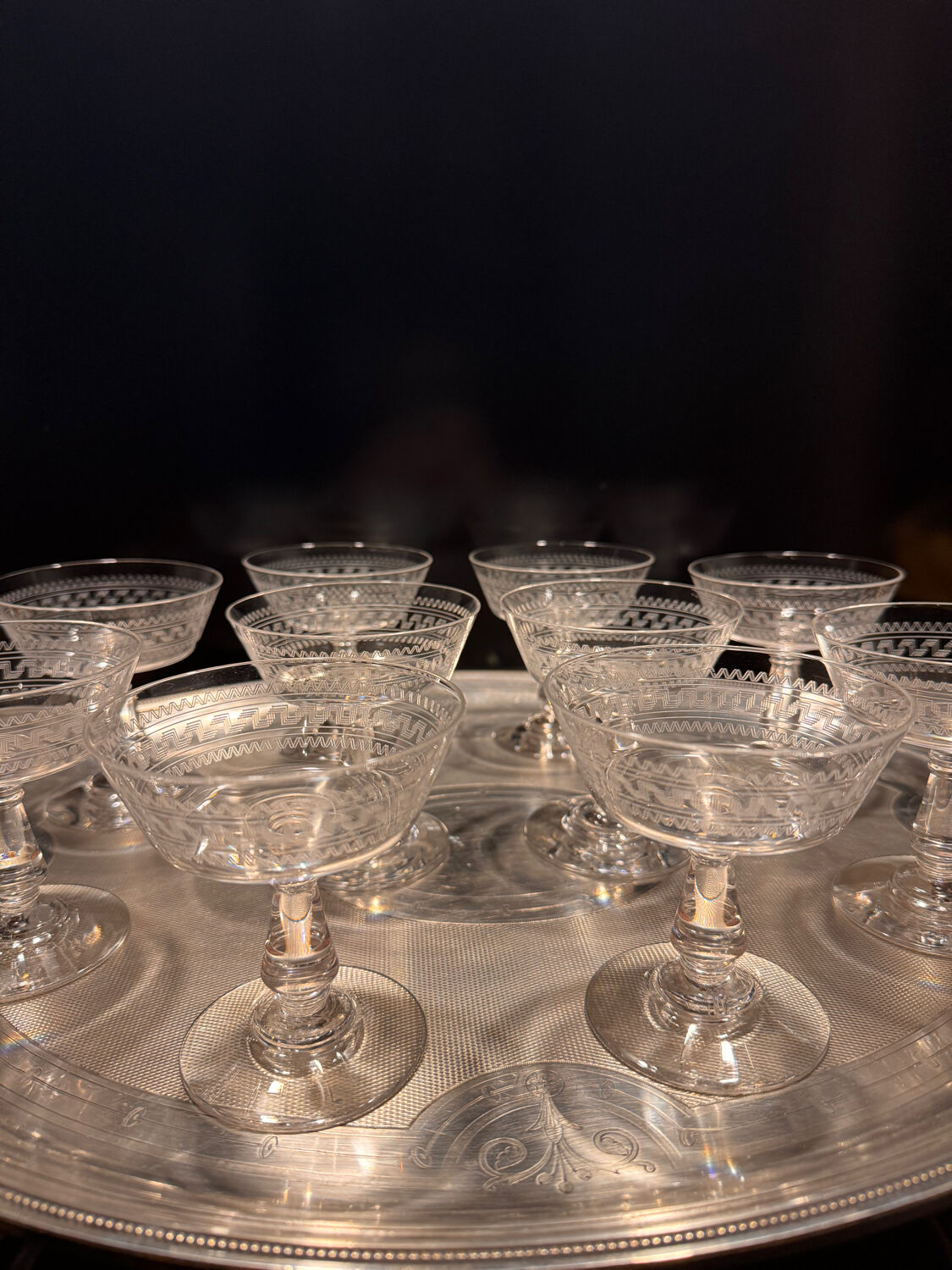 Baccarat, set of 10 engraved crystal champagne glasses from 1900.