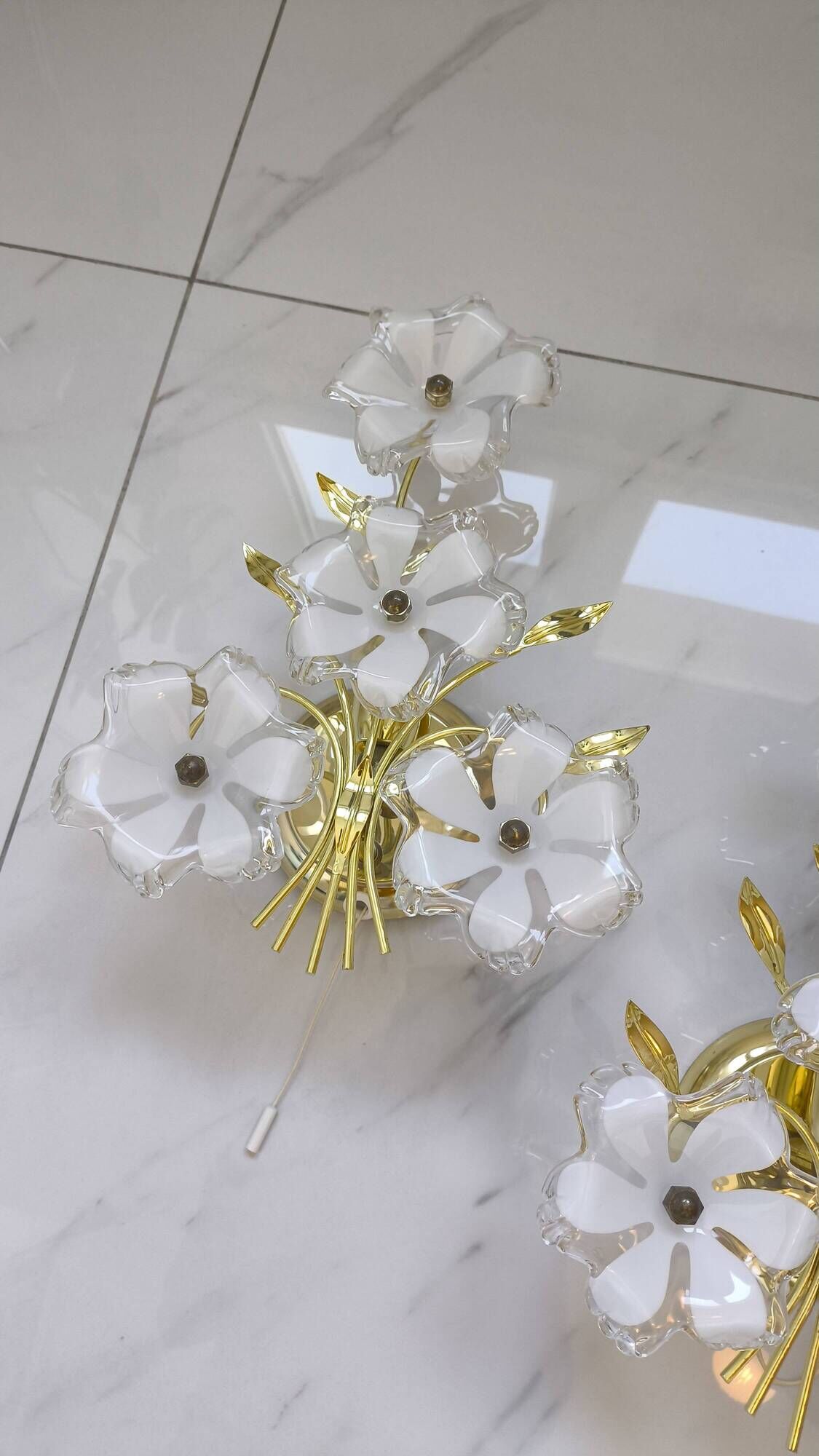 pair of floral wall lights from the 60s-70s