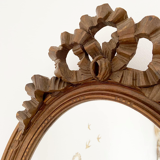 Louis XVI style oval knot mirror