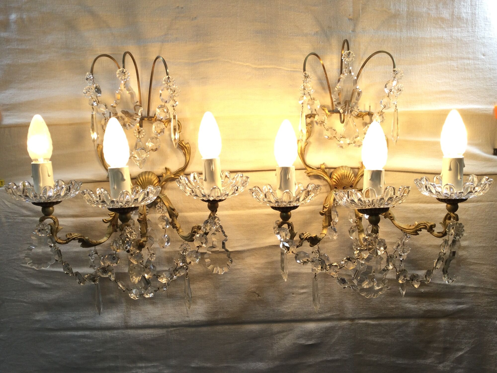 Pair of 3-light bronze and crystal wall lights
