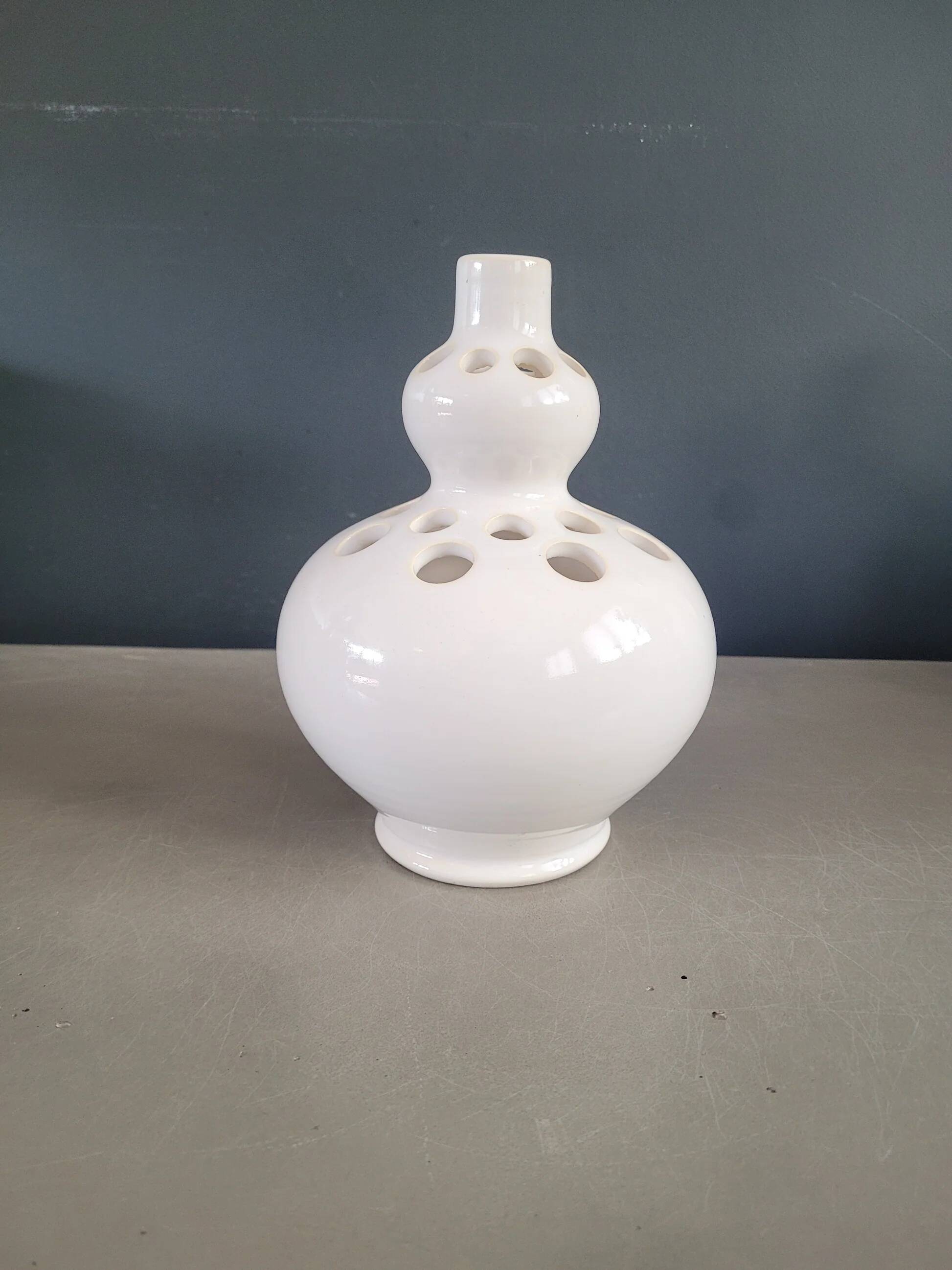 Ceramic flower holder with 24 holes