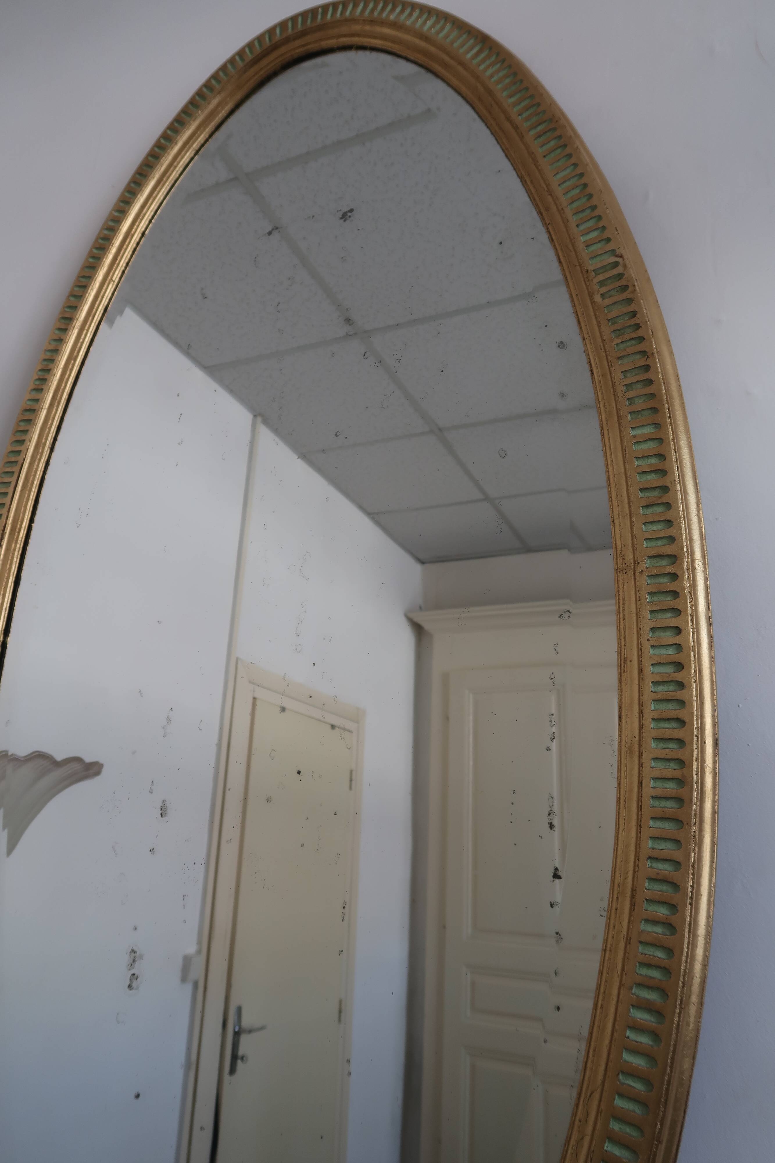 Empire style oval mirror